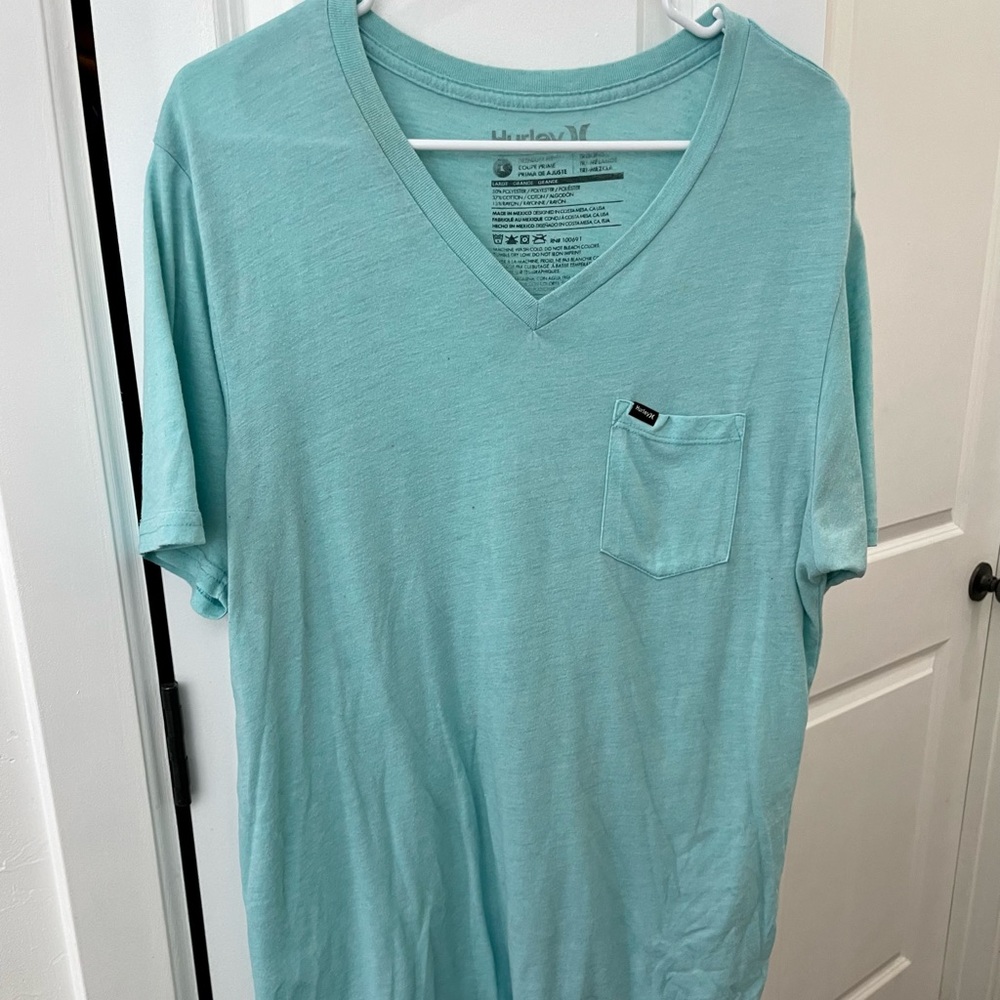Blue Hurley v neck shirt